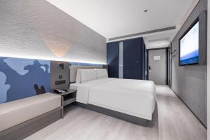 Postel nebo postele na pokoji v ubytování Atour Light Hotel Beijing West Station North Square