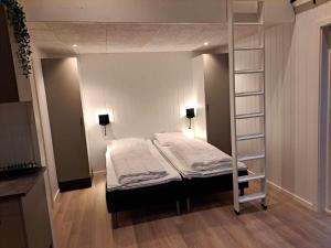 Postel nebo postele na pokoji v ubytování Motel Glyngøre