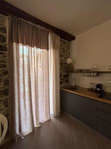 Kuchyň nebo kuchyňský kout v ubytování HH Moneglia la Piazzetta