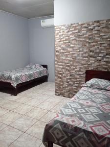 Postel nebo postele na pokoji v ubytování Apartamento en la playa + 6 fotografií