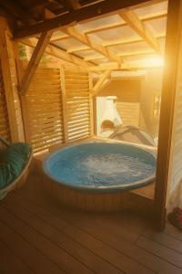 Φωτογραφία από το άλμπουμ του Domek Letniskowy Monika σε Jeziorowskie