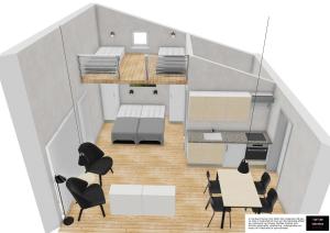 an overhead view of a room with a table and chairs at Motel Glyngøre in Roslev