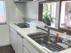 Cucina o angolo cottura di ぬちゆい