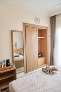 A bed or beds in a room at Teba Hotel Ras Elbar