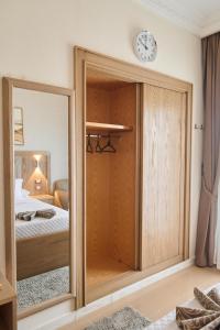 A bed or beds in a room at Teba Hotel Ras Elbar