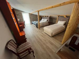 an overhead view of a bedroom with two beds at Moja Mona in Subotica