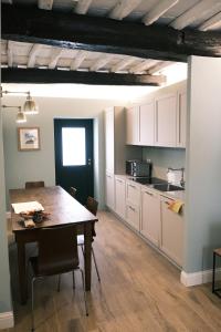 A kitchen or kitchenette at Swing 69 by PortofinoVacanze