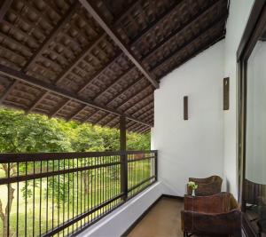 Balkón nebo terasa v ubytování SigiriyaJungles Resort & Spa