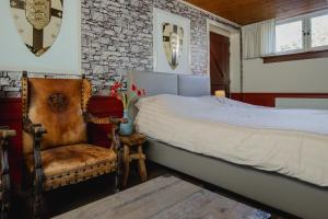 Postel nebo postele na pokoji v ubytování Hotel Vesting Bourtange