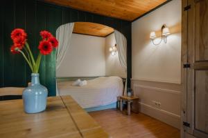 Postel nebo postele na pokoji v ubytování Hotel Vesting Bourtange