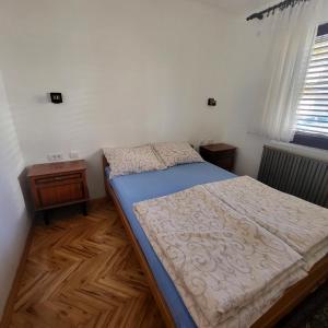Giường trong phòng chung tại Accommodation Konak