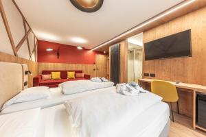 TV a/nebo společenská místnost v ubytování Active Hotel Malita