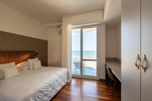 Postel nebo postele na pokoji v ubytování HR Resort