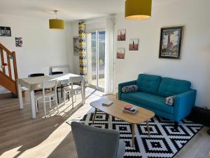 Posezení v ubytování 208-Maison 6p à proximité de Sables-D'or-les-Pins