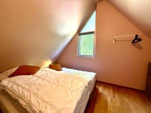 Postel nebo postele na pokoji v ubytování De Buizerd