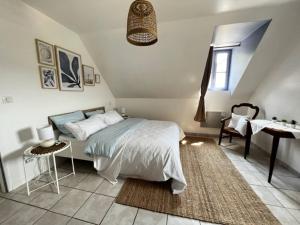 Postel nebo postele na pokoji v ubytování Gite du belvédère à Rocamadour