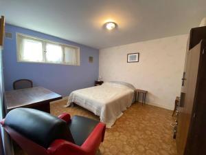 Posteľ alebo postele v izbe v ubytovaní la maison d'enfance