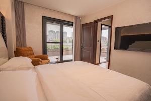 Candy Homestay Zhangjiajie Complimentary Airport & Train Station Pickup客房内的一张或多张床位