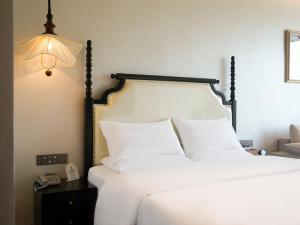 Candy Homestay Zhangjiajie Complimentary Airport & Train Station Pickup客房内的一张或多张床位
