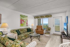 a living room with a couch and a table at Edgewater Condo Unit #303 Apts in South Padre Island