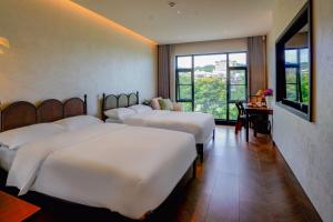 Candy Homestay Zhangjiajie Complimentary Airport & Train Station Pickup客房内的一张或多张床位