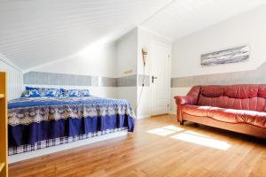Ένα ή περισσότερα κρεβάτια σε δωμάτιο στο Secluded house in Lofoten-Private swimming pool! +20 φωτογραφίες