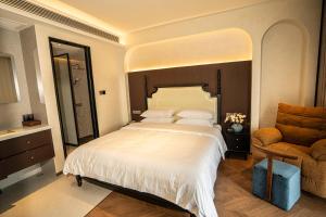 Candy Homestay Zhangjiajie Complimentary Airport & Train Station Pickup客房内的一张或多张床位