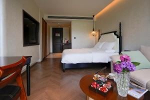 Candy Homestay Zhangjiajie Complimentary Airport & Train Station Pickup客房内的一张或多张床位