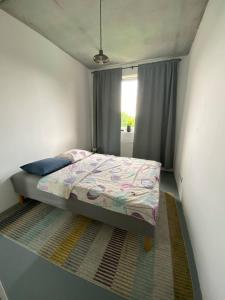 Ένα ή περισσότερα κρεβάτια σε δωμάτιο στο Apartment w stylu loft