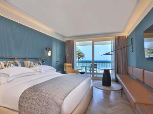 Ein Bett oder Betten in einem Zimmer der Unterkunft Mövenpick Hotel Beirut