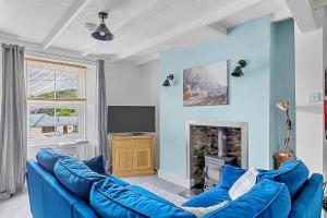 Televiisor ja/või meelelahutuskeskus majutusasutuses Finest Retreats - Farleigh Cottage