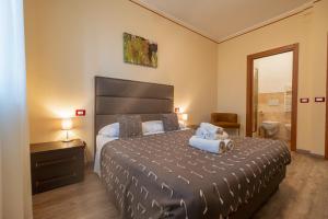 Postel nebo postele na pokoji v ubytování Agriturismo Rascioni & Cecconello