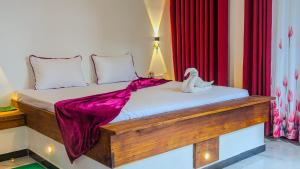 Letto o letti in una camera di Nature World Jungle Paradise