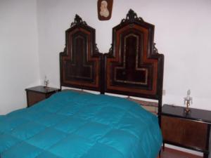 Letto o letti in una camera di Casa David
