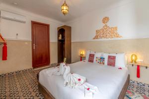 Voodi või voodid majutusasutuse Riad Mokha Mokha & Spa toas