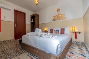 Voodi või voodid majutusasutuse Riad Mokha Mokha & Spa toas