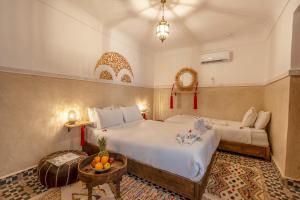 Voodi või voodid majutusasutuse Riad Mokha Mokha & Spa toas