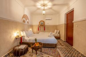 Voodi või voodid majutusasutuse Riad Mokha Mokha & Spa toas