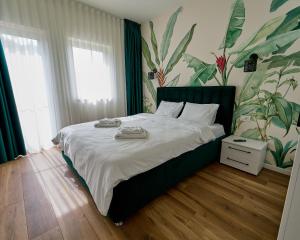 Un pat sau paturi într-o cameră la Nadesa - Mountain View Villas
