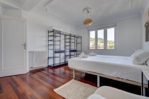 Posteľ alebo postele v izbe v ubytovaní Apartamento Ulia by SanSe Holidays