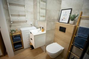 Koupelna v ubytování Apartament Strzelców 4 + 16 fotografií