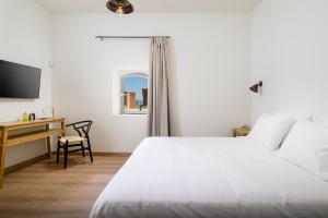 Ένα ή περισσότερα κρεβάτια σε δωμάτιο στο Casa Lotzeta in Piskopiano - 3BD Relaxing Villa - Private Jacuzzi
