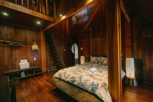 Ένα ή περισσότερα κρεβάτια σε δωμάτιο στο Ducampo House Dalat