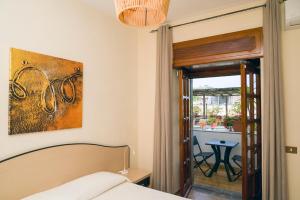 Postel nebo postele na pokoji v ubytování Casa Di Meglio Dependance + 37 fotografií