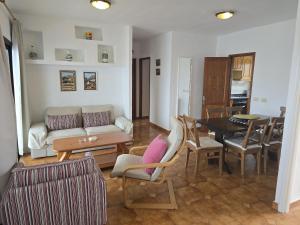 a living room with a couch and a table at Costa Luz BL 4 6 in Puerto del Carmen