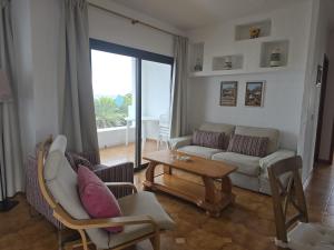 a living room with a couch and a table at Costa Luz BL 4 6 in Puerto del Carmen