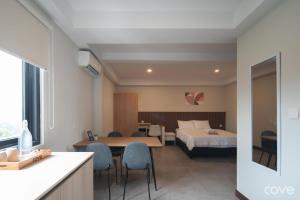 Postel nebo postele na pokoji v ubytování Cove Rumaya