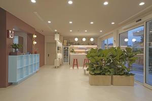 Vstupní hala nebo recepce v ubytování Hotel Unico by Dori + 37 fotografií