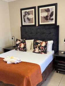 Katil atau katil-katil dalam bilik di Masana Hotels