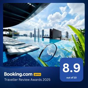 a picture of a swimming pool with a city at Eaton Suites KLCC Kuala Lumpur in Kuala Lumpur